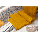 Плед из хлопка жемчужной вязки горчичного цвета из коллекции essential, 130х180 см