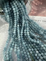 Нить бусин из тонированного кварца 8мм, гладкие