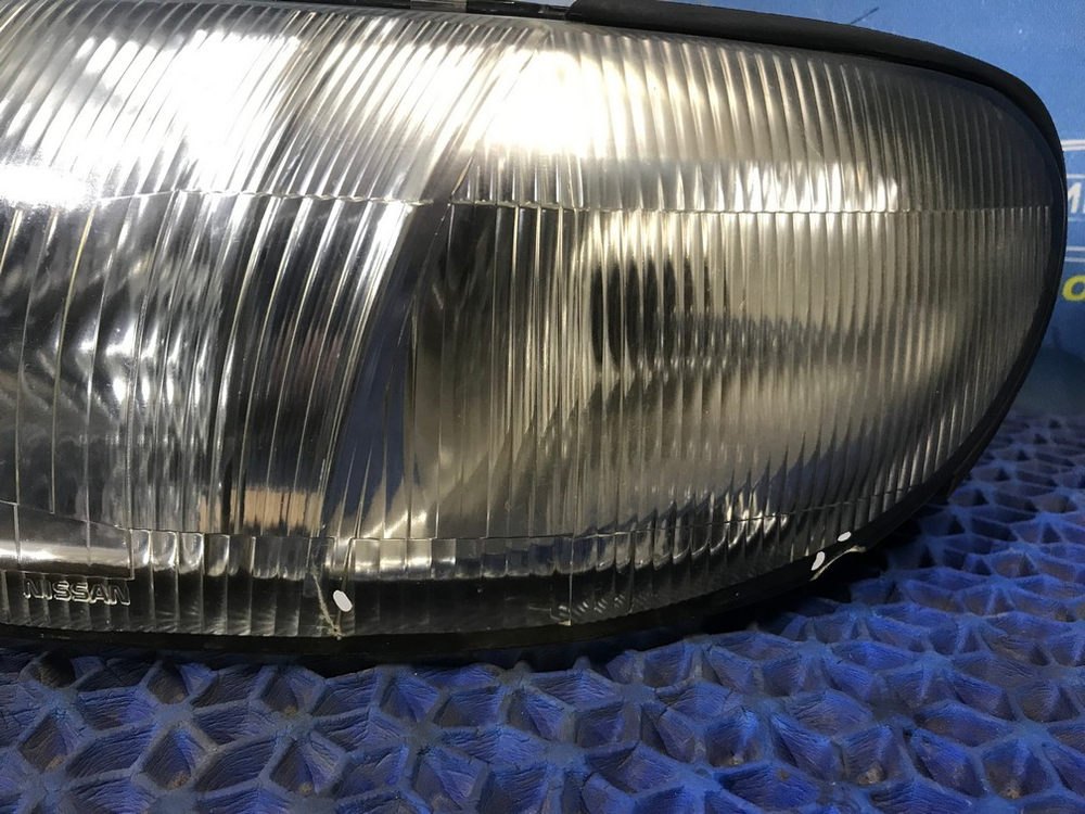 Фара передняя левая NISSAN BLUEBIRD 1993