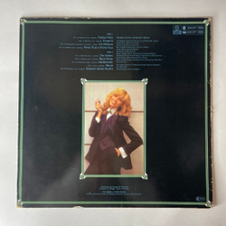 Винтажная виниловая пластинка LP Amanda Lear Never Trust A Pretty Face (Германия 1979)
