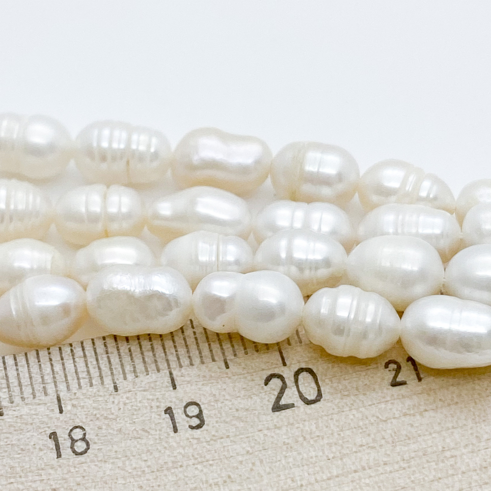 Жемчуг, размер около 7-9*6-5,5 мм, цена за нить 34 см (около 40 шт)