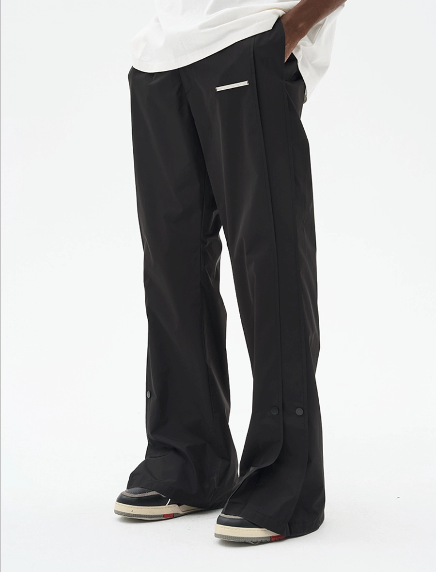 Брюки HARSHandCRUEL Wide fit Nylon Buttoned Pants