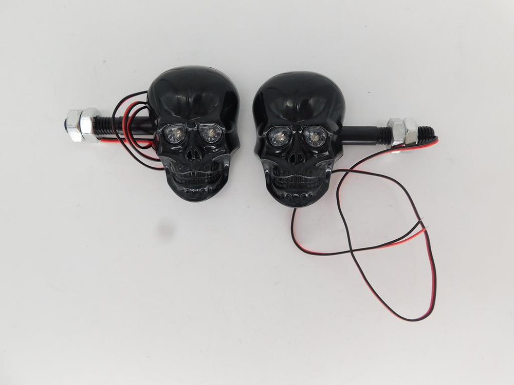 Поворотники универсальные череп чёрные