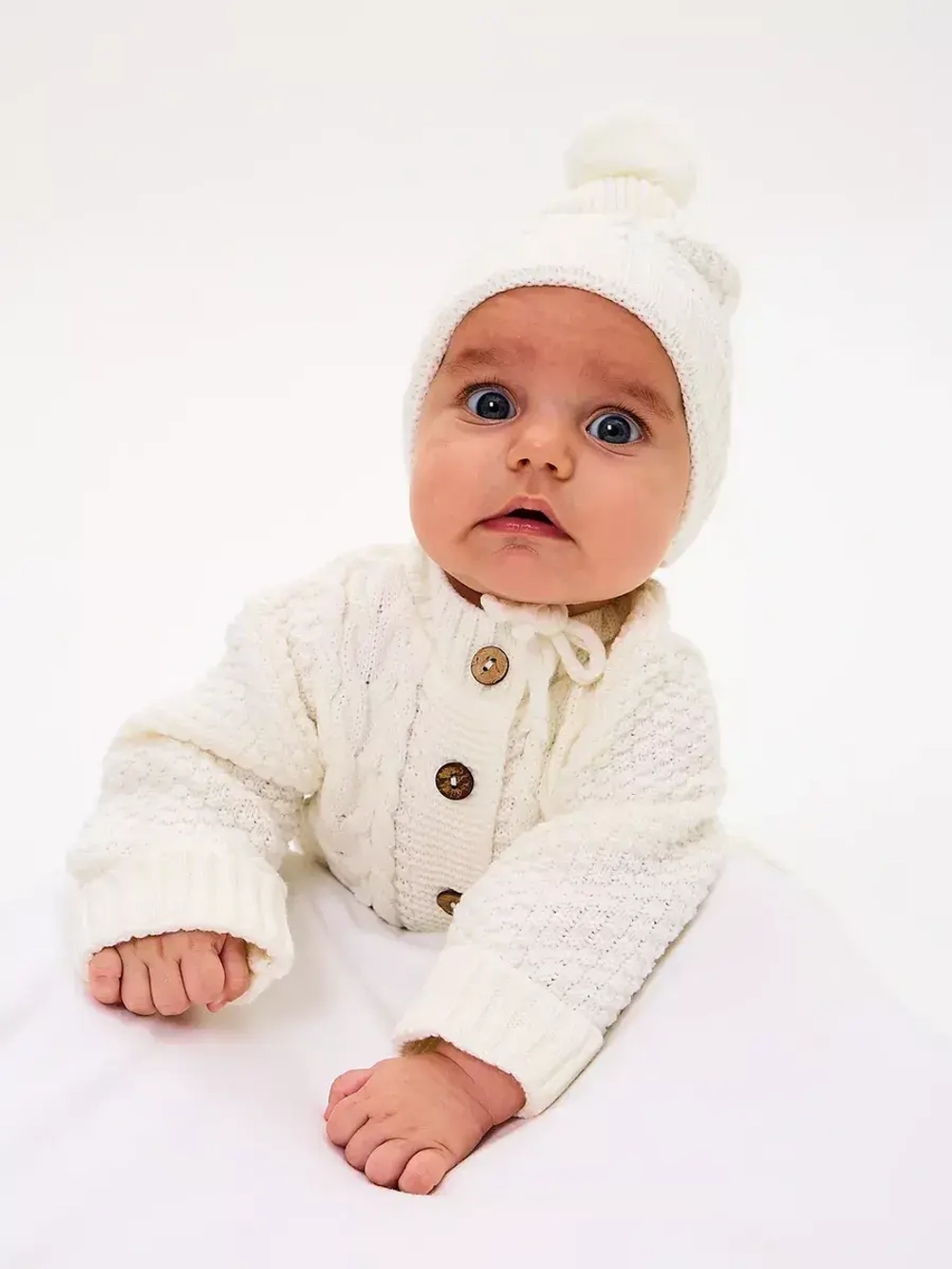 вязаный комбинезон для новорожденных