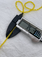 Бусины стеклянные биконусы на нити желтые