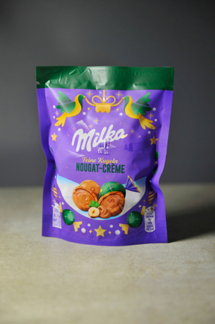 Шоколадные шарики Milka имбирный пряник 90г.
