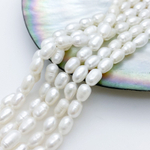 Жемчуг, размер около 6,5-7*4,5 мм, цена за 27-28 шт (1/2 нити)