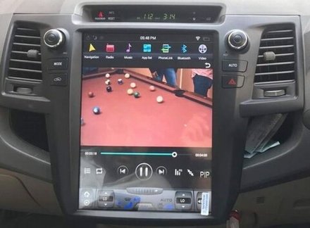 Магнитола для Toyota HiLux 2011-2015 - Carmedia ZF-1257-GE вертикальный экран в стиле "Тесла" на Android 13, 8Гб+128Гб, CarPlay, 4G SIM-слот