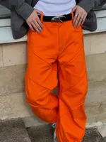 Оранжевые брюки 