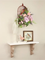 Композиция настенная с цветами в металлической клетке