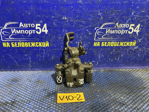 Суппорт тормозной задний правый NISSAN TINO 2001
