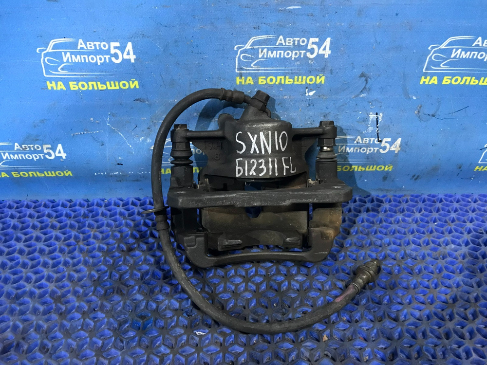 Суппорт тормозной передний левый TOYOTA IPSUM 1996-2001