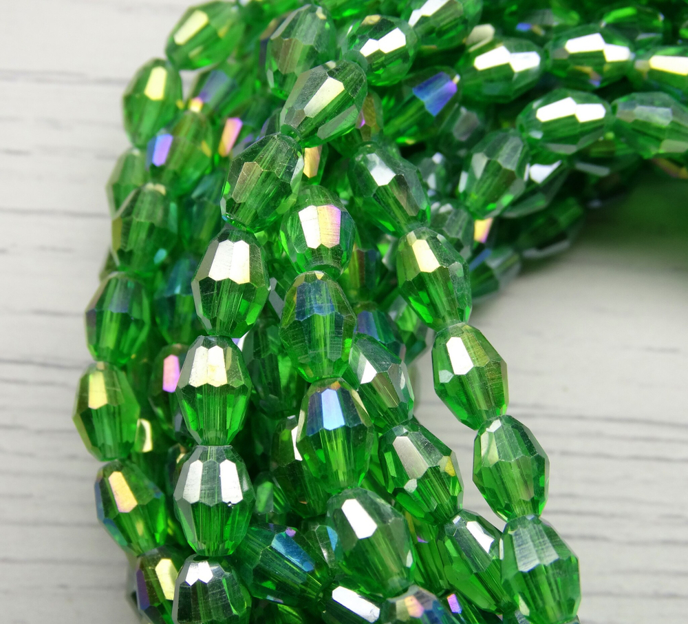 БО005ДС68 Хрустальные бусины-овалы, цвет: зеленый AB прозрачный, размер 6х8 мм, кол-во: 25 шт.