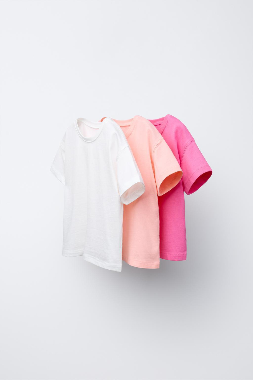 ZARA НАБОР ИЗ ТРЕХ ОДНОТОННЫХ ФУТБОЛОК, КОРАЛЛОВЫЙ