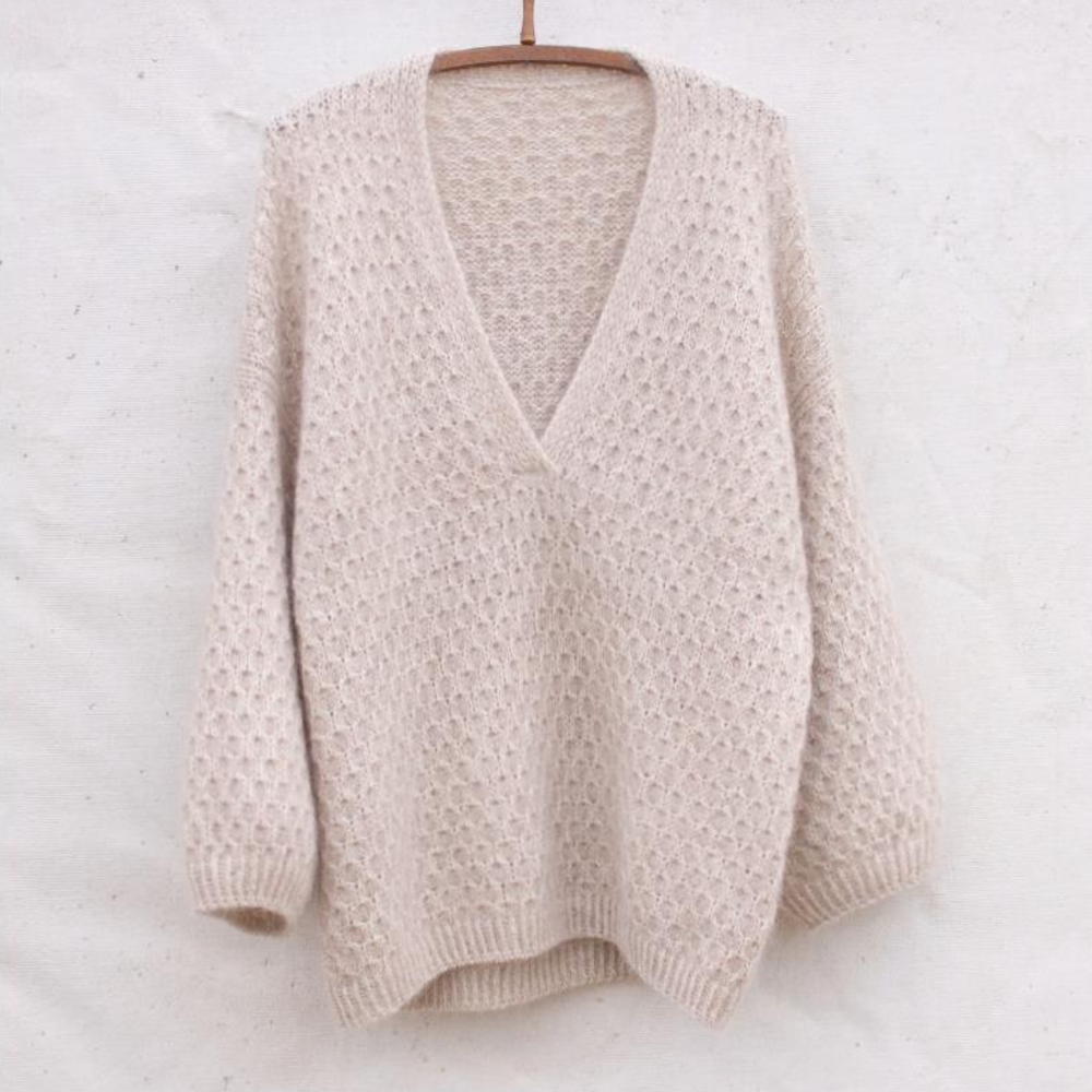 Описание по вязанию джемпера спицами с V-образной горловиной "Vent"