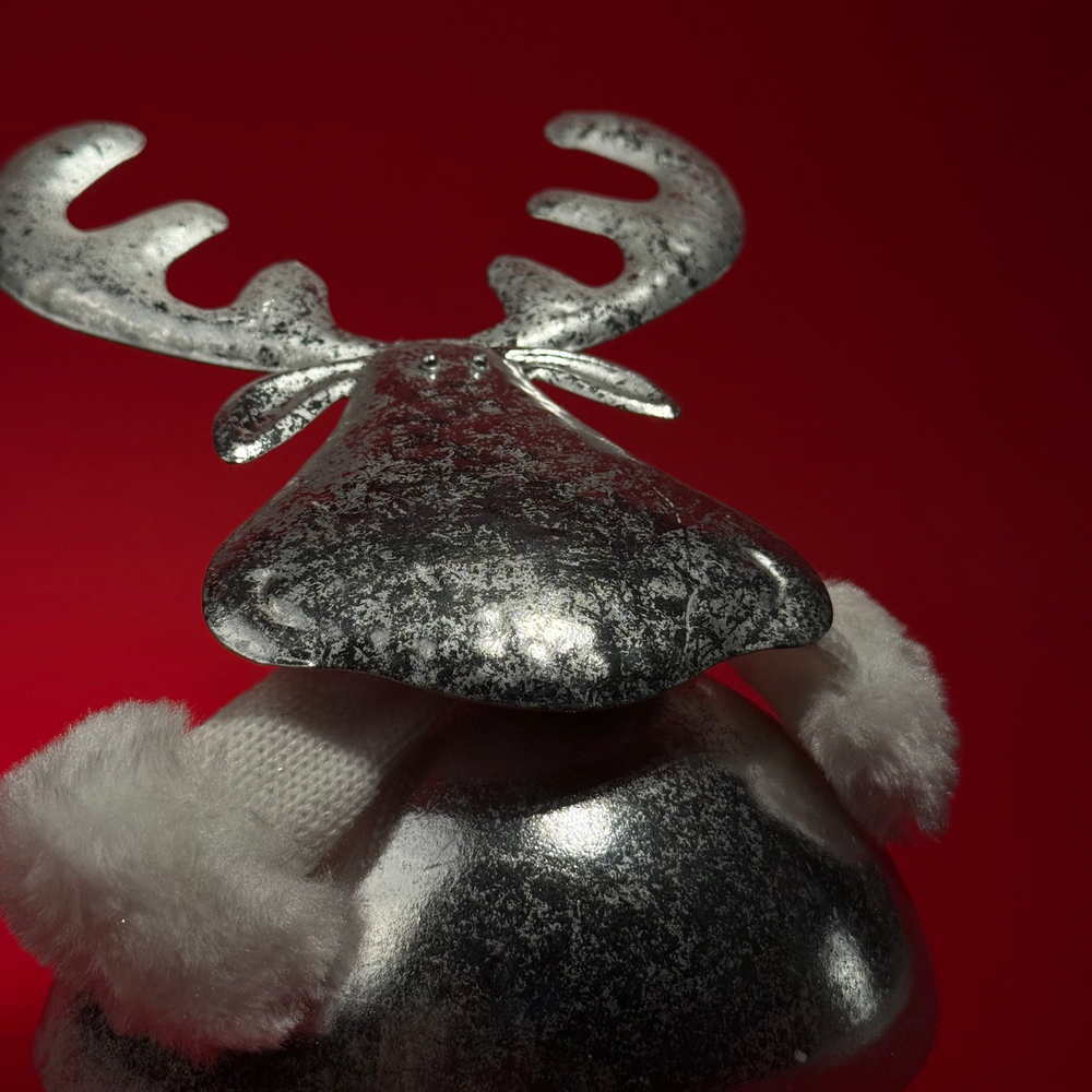 Олень на пружине