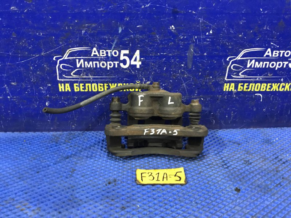 Суппорт тормозной передний левый MITSUBISHI DIAMANTE 2000