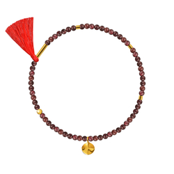 браслет из граната с красной кистью