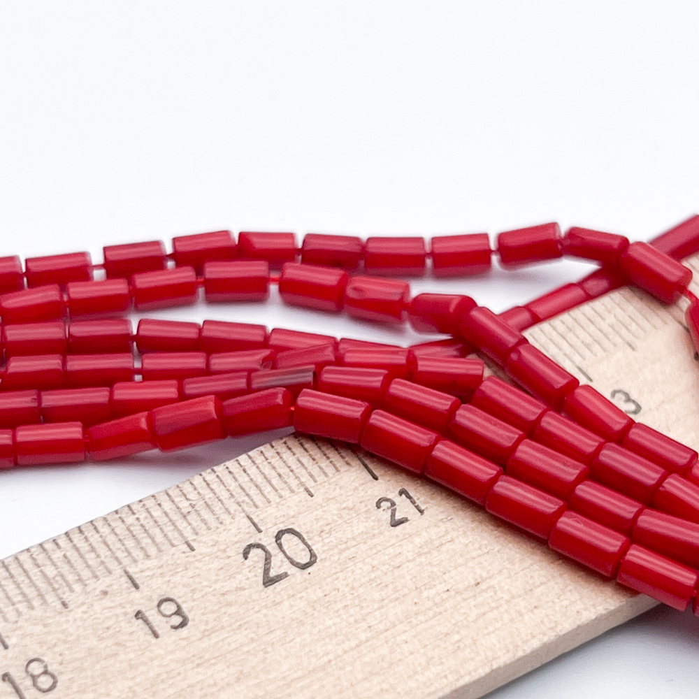 Коралл тонированный, размер около 5,3*3 мм, цена за 36-37 шт (1/2 нити)