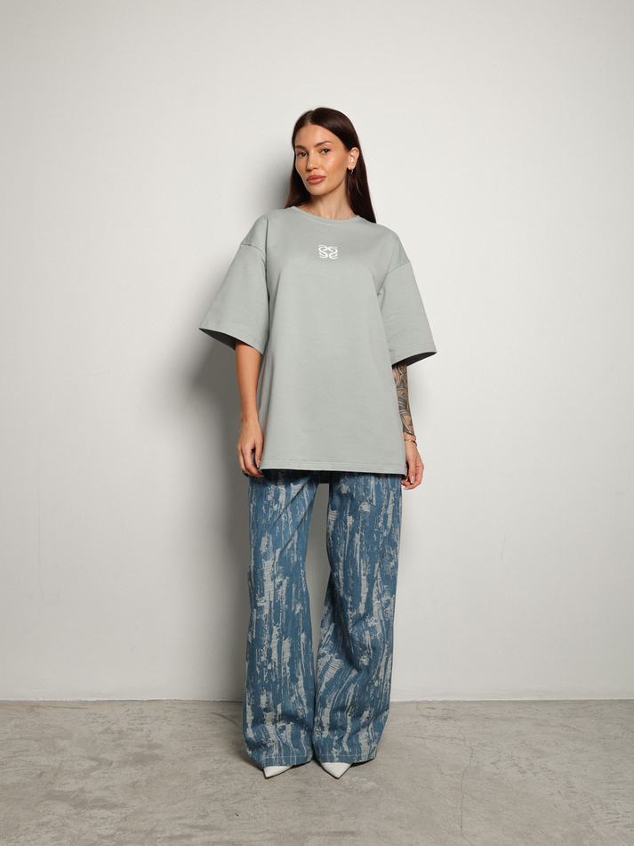 Джинсы с гранжевым эффектом голубые