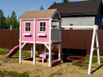 Детский деревянный домик с качелями гнездо "Петерсвуд"