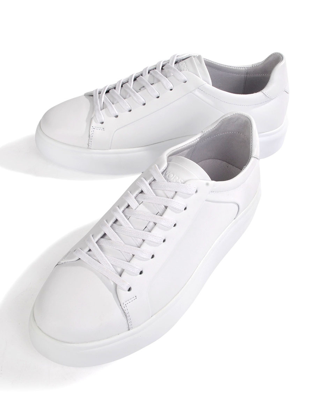 Демисезонные белые кеды из кожи для женщин