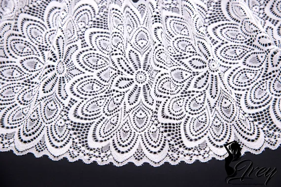 03-257 Кружево эластичное 17 см, павлин, теплый белый