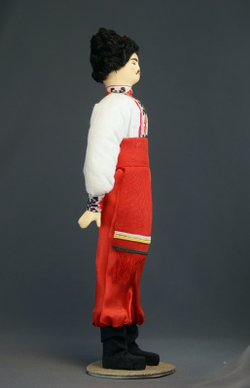 Кукла коллекционная фарфоровая в Украинском мужском костюме К.19-н. 20 в.