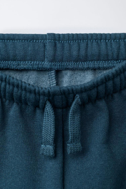 ZARA БРЮКИ-ДЖОГГЕРЫ FLOCK «МИККИ МАУС» © DISNEY, НЕФТЯНОЙ