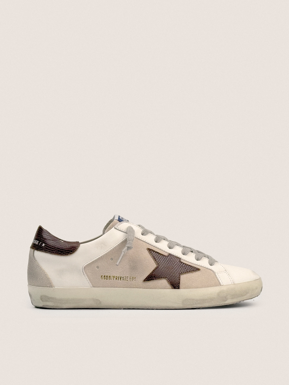 Men’s Super Star with suede inserts and lizard-print leather star