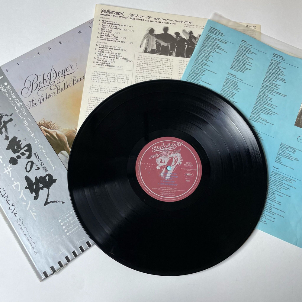 Винтажная виниловая пластинка LP Bob Seger and The Silver Bullet Band Against The Wind (Japan 1980) (Obi)