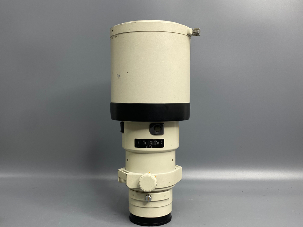 Minolta AF APO TELE 400mm f/4.5 G точечки под линзой