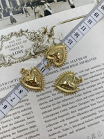 Подвеска "Сердце с шипами" золотистое мятое