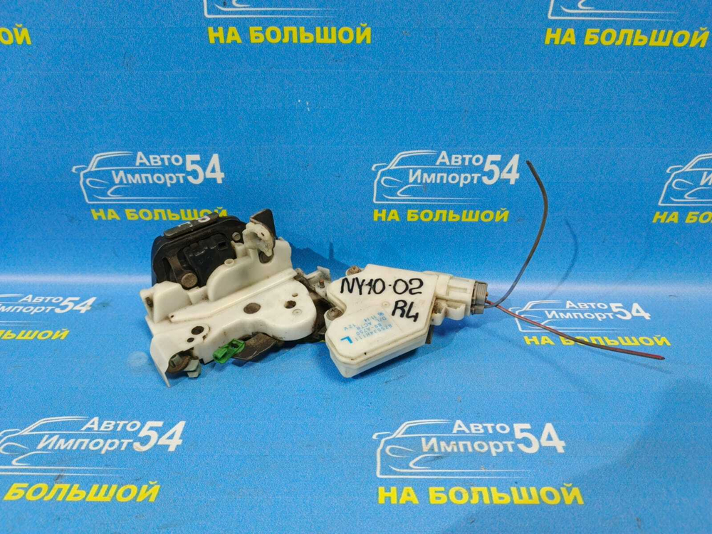 Замок двери задней левой NISSAN WINGROAD 1996