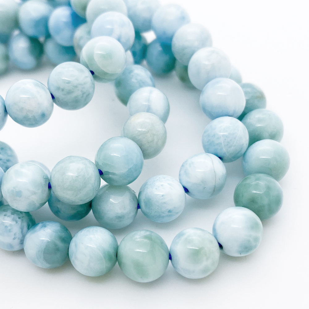 Ларимар, диаметр 7,6-7,7 мм, цена за 12 шт (1/4 нити)