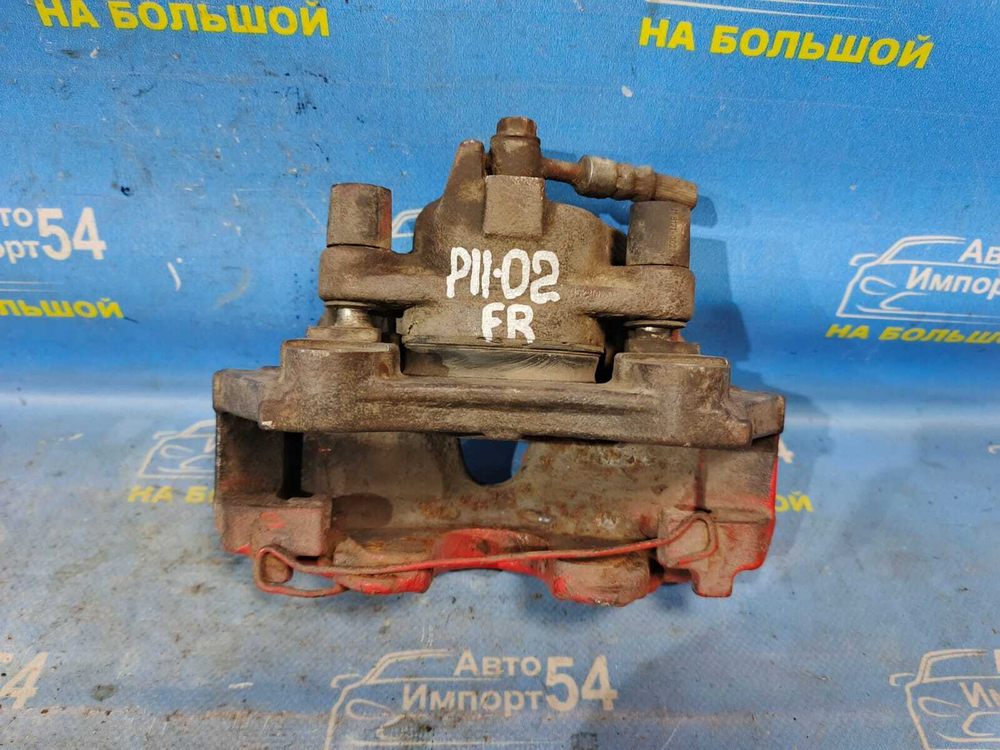 Суппорт тормозной передний правый NISSAN PRIMERA 1999