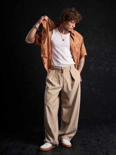 Бежевые брюки 2s1 studio в полоску