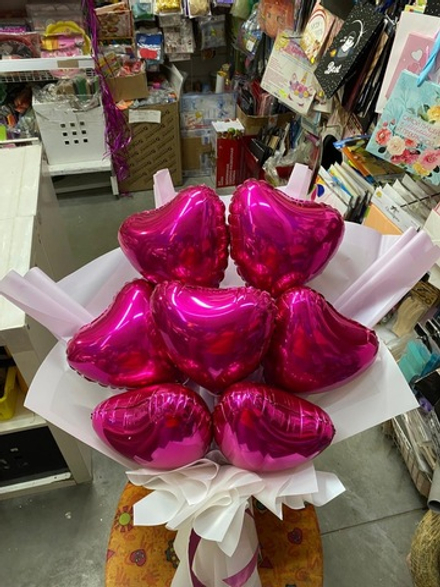 Крафтовый букет фуксия из 7 сердец