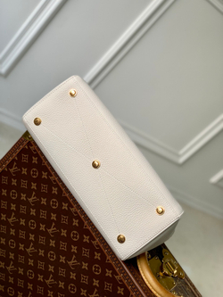 Louis Vuitton Lock It MM Bag
