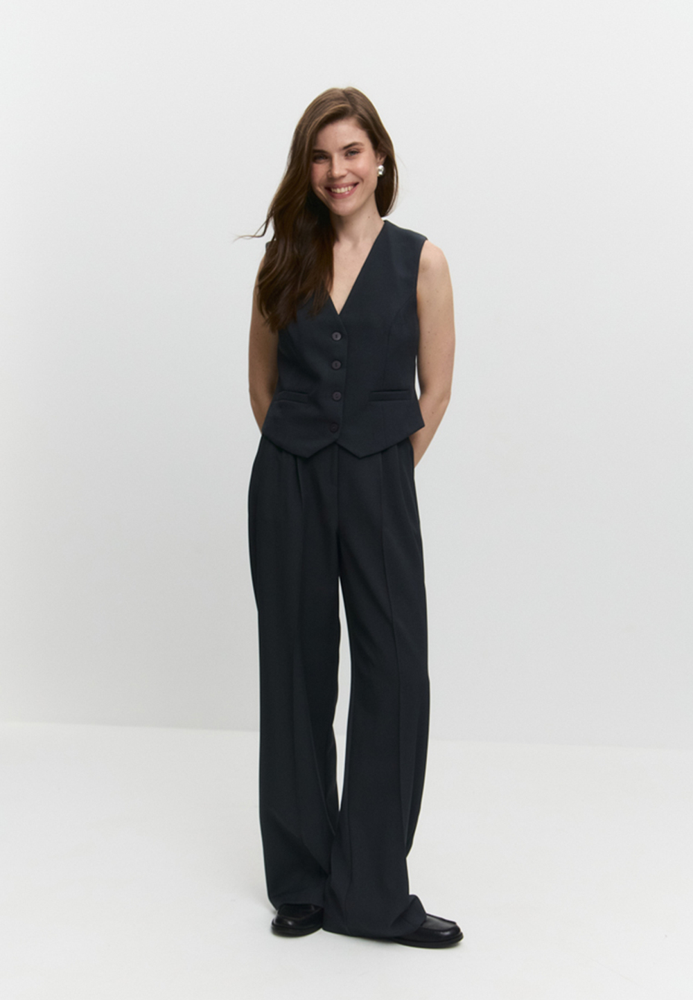 Брюки с простроченными стрелками