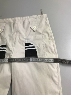 Брюки с контрастными карманами 40 размер