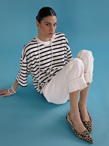 Прямые укороченные белые джинсы