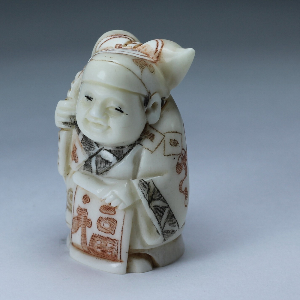 Нэцкэ Ребенок с тыквой горлянкой и табличкой "счастья"