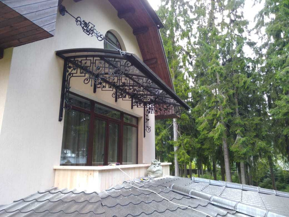 Изготовление кованых козырьков