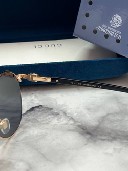Солнцезащитные очки Gucci