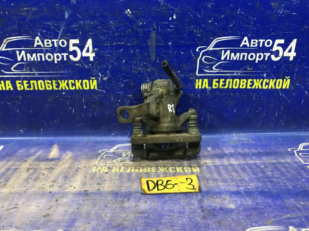 Суппорт тормозной задний правый Honda INTEGRA 2000