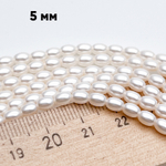 "Майорка" рис, цвет белый, размер около 5*3,5 мм, цена за отрезок 19 см (1/2 нити)