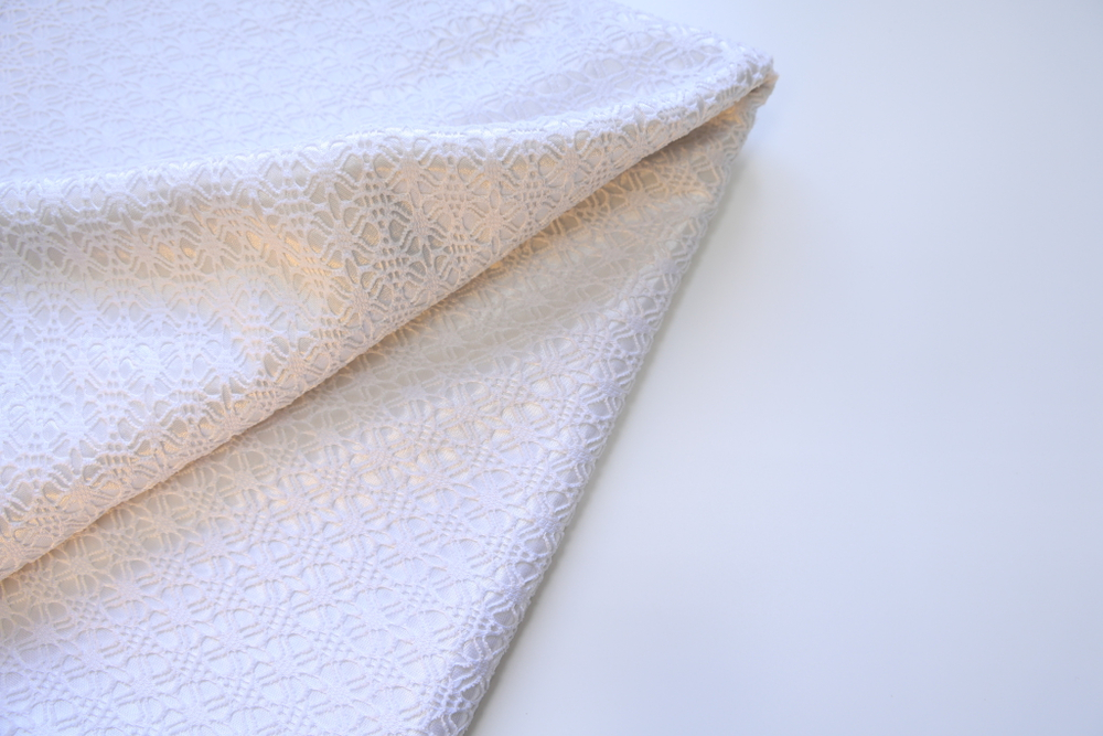 Полотно вязаное на трикотаже белый