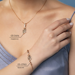 Подвеска «Загадочность» из комбинированного золота с натуральными топазами white