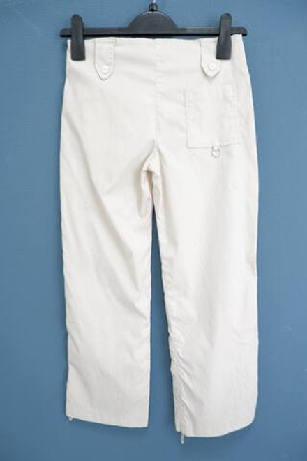 Брюки с контрастными карманами 40 размер